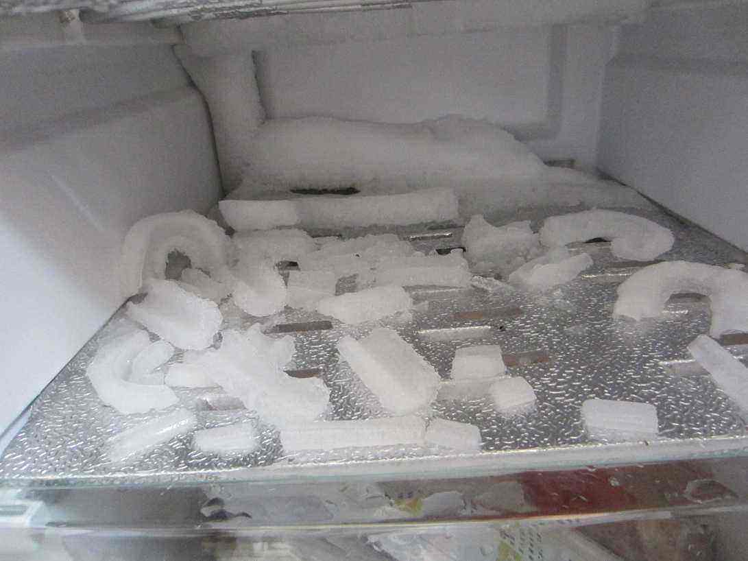 西宁冰箱维修部电话-海尔冰箱冷藏室结冰-冰箱结冰